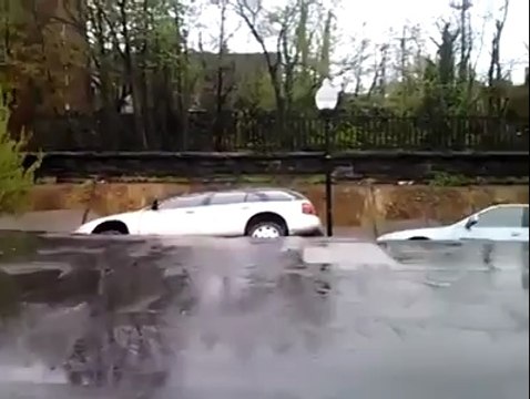 Cars Swallowed by Ground on a Street in Baltimore