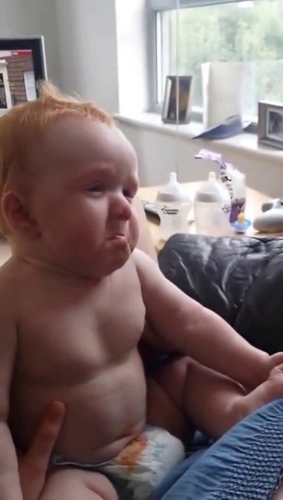 Baby scared and laughing at the same time (Very Funny)