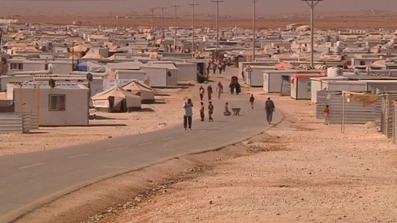 Turkey says Assad is "barrier" to humanitarian aid