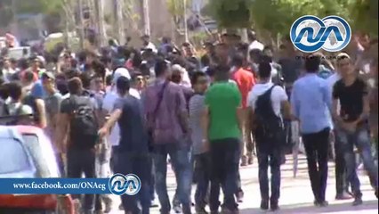 شاهد .. ملثمون يلوحون بالذبح لقوات الأمن أمام جامعة المنصورة والأمن يغلق الأبواب