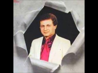 AHMET HOŞSÖYLER - GÜLÜNCE GÖZLERİNİN İÇİ GÜLÜYOR-hicaz şarkı