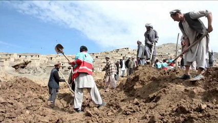 Afghans search for landslide victims