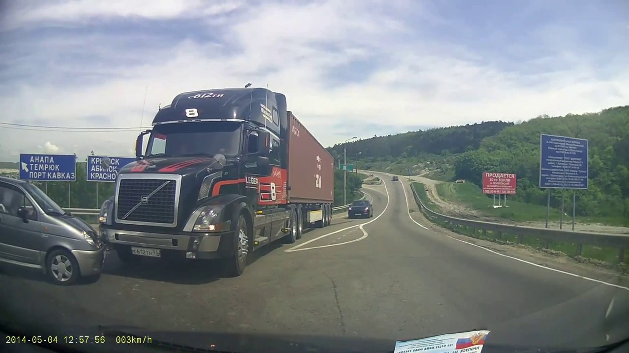 Russian Truck Driver Barely Avoids Crash By Slamming Brakes