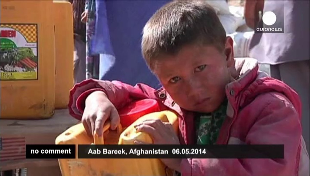 Afghan President Hamid Karzai visits landslide...