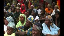 Parents of abducted Nigerian schoolgirls gather outside school