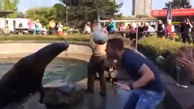 Arsenal forward Lukas Podolski freestyles with a SEAL