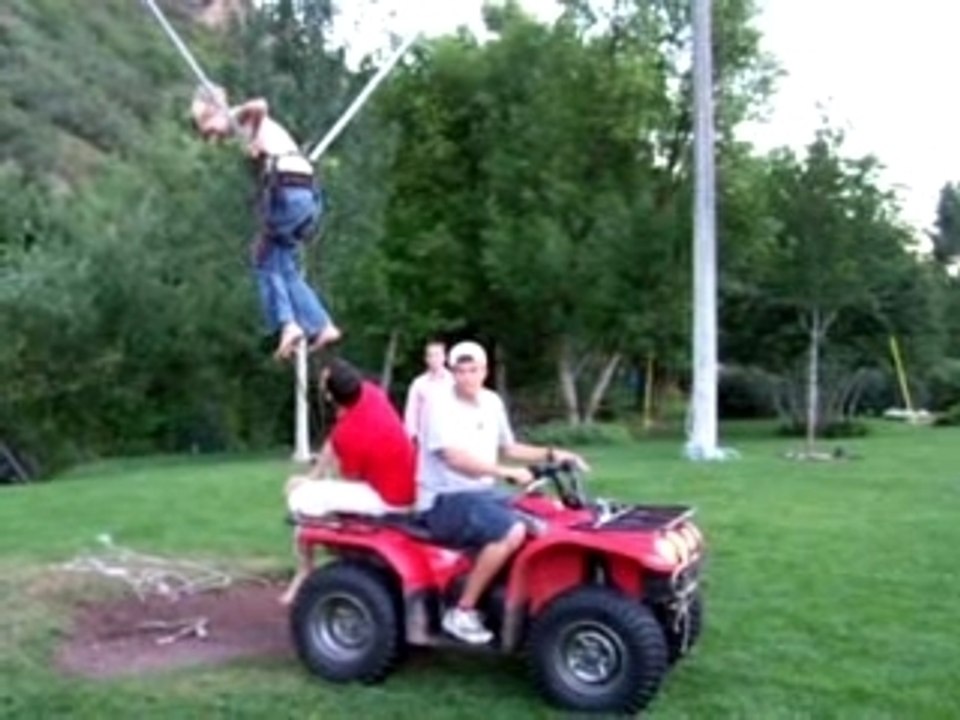 Girl in human sling shot