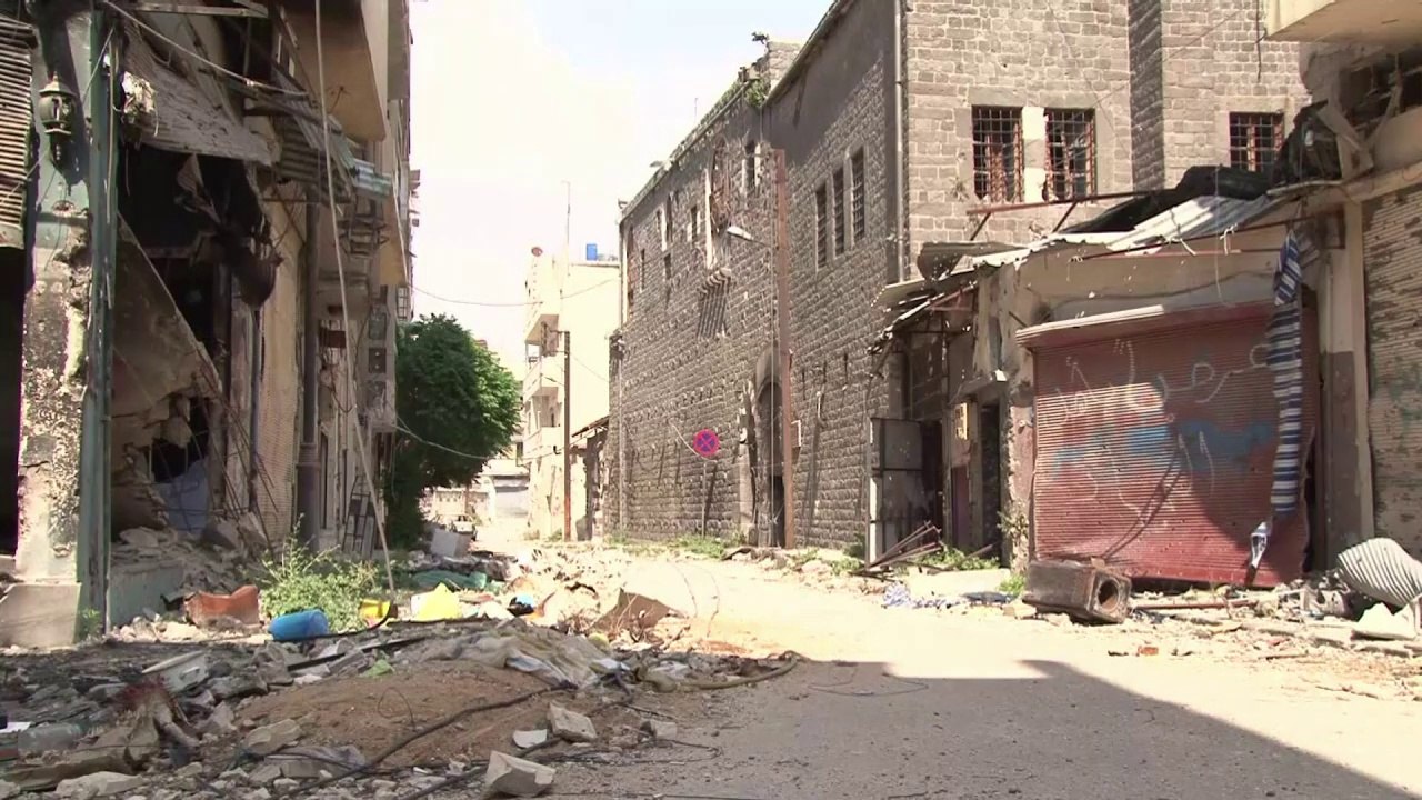 Civiles regresan a Homs