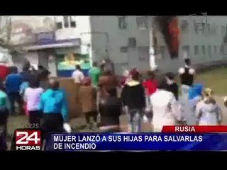 Madre arroja a hijas por la ventana para salvarlas de incendio en edificio de Rusia