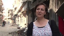 اهالي حمص يعودون الى مدينتهم القديمة لتفقد منازلهم المدمرة