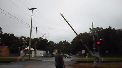 Railroad man goes nuts when crossing malfunctions ~ EDITED