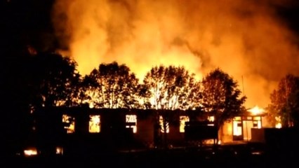 Ukraine military barracks burn on eve of self-rule referendum