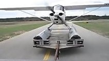 Sea plane takes off from a truck bed