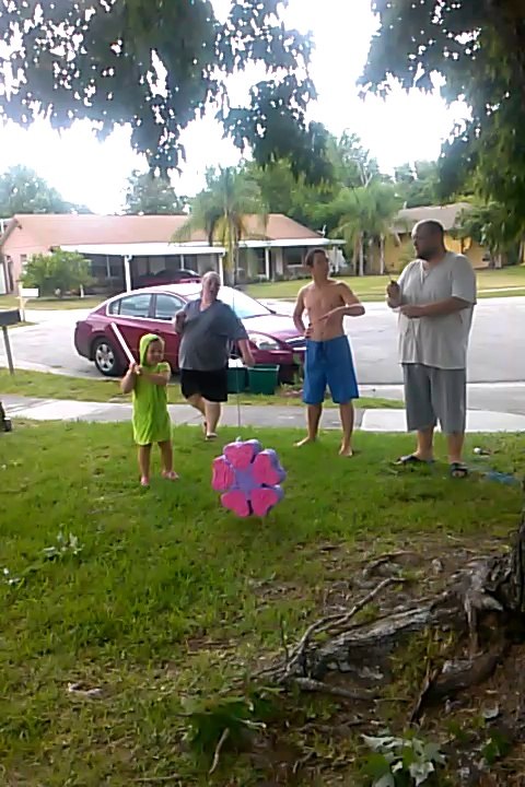 hitting the pinata ~ Pauline's 3rd Birthday