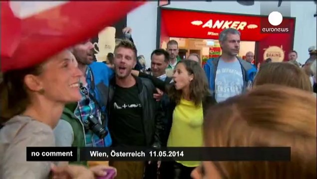 Eurovision winner Conchita Wurst returns home in triumph