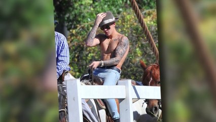 Justin Bieber Whips off his Shirt for a Horse Ride