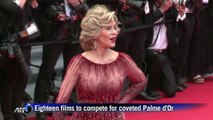 Movie stars poured onto the Cannes red carpet on Wednesday for a glittering ceremony heralding the start of the world's biggest film festival