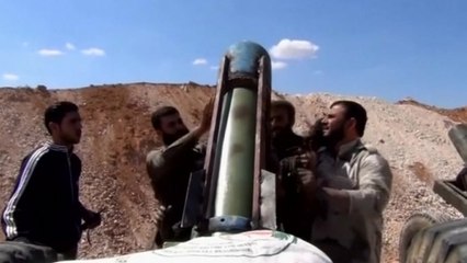 Rebels battle for a checkpoint in Syria