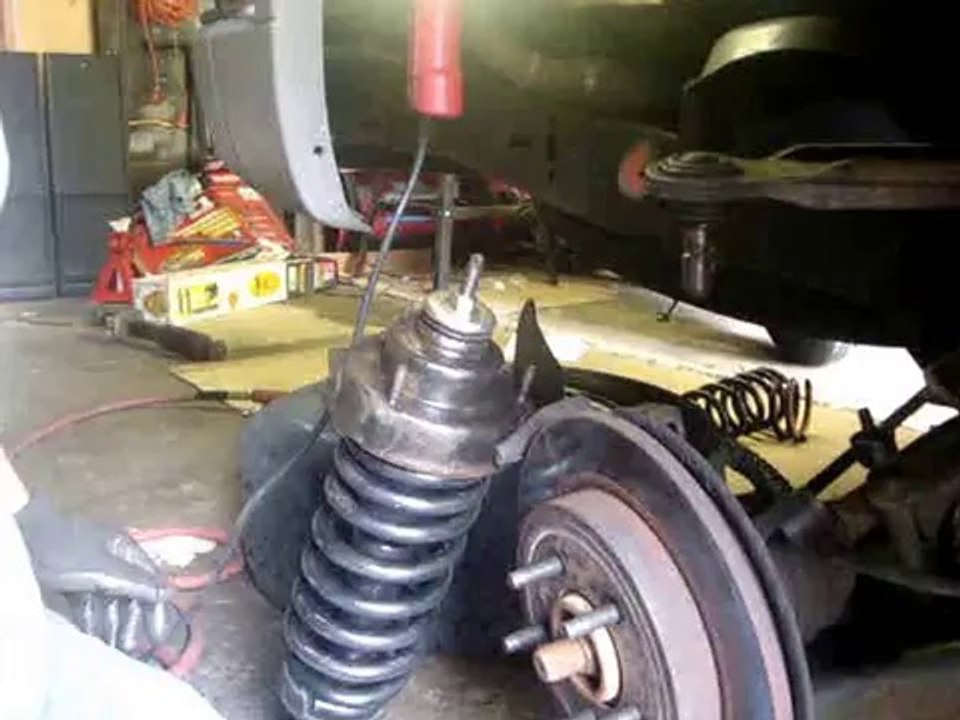 Como Quitar Cambiar amortiguador trasero Ford Explorer 1996 1997 1998 1999 2000 2001