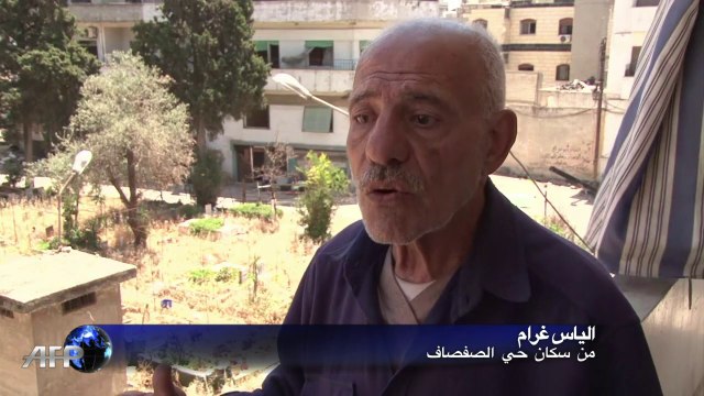 شعارات المقاتلين على جدران حمص القديمة تروي حكاية عاصمة الثورة