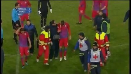 Fans attack footballers on pitch, burns, broken bones, karate kicks !!