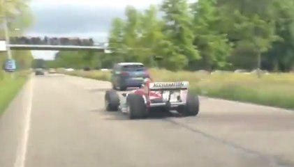 Real F1 car driving in traffic !