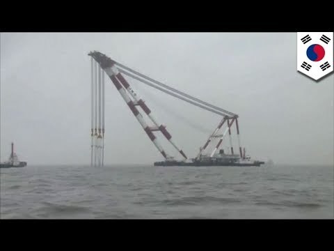Massive floating cranes move into position of sunken South Korean ferry