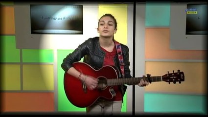 Une passion: le chant et la guitare