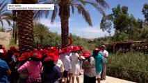 Pilgrims visit river where Jesus was baptized