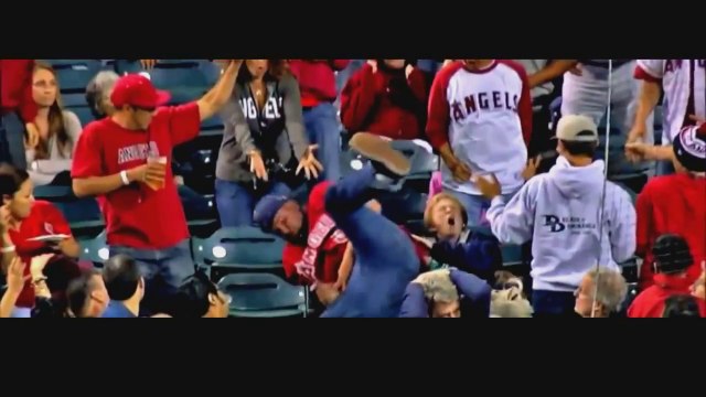 Baseball Fans jumping on an Old Lady to catch a ball