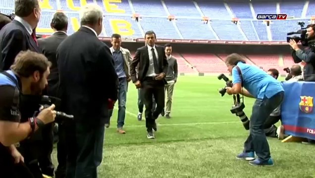 Luis Enrique steps onto the Camp Nou pitch
