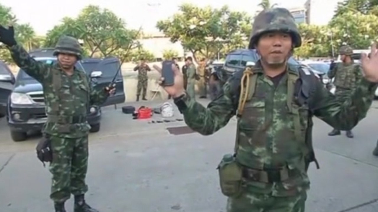 Thai soldiers confiscate weapons after army declares coup