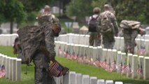 Memorial Day flags placed at Arlington National Cemetery graves