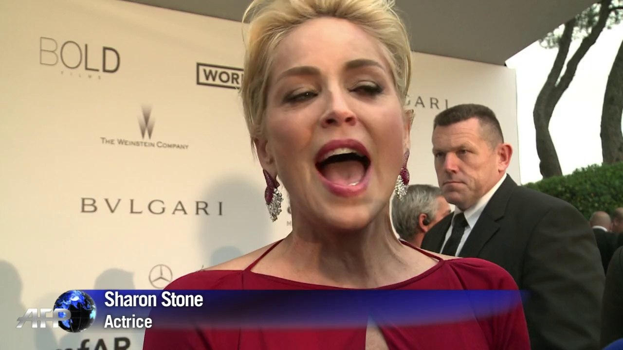 Sharon Stone, Carla Bruni et John Travolta au gala de l'amfAR