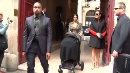 Kim and Kanye leave Paris apartment as wedding celebrations draw near