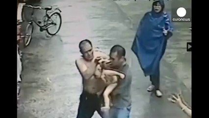 Baby Falls From building, Caught By a Man In Street