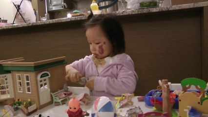 Girl And Sylvanian Families