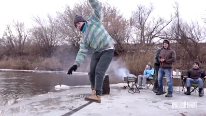 Awesome guys playing Ice slackline