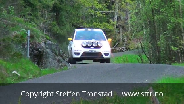 Impressive Rally accident - Cameraman hit by wheel