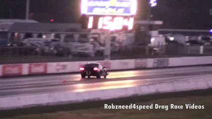 CAR WHEELIING IN DRAG RACE