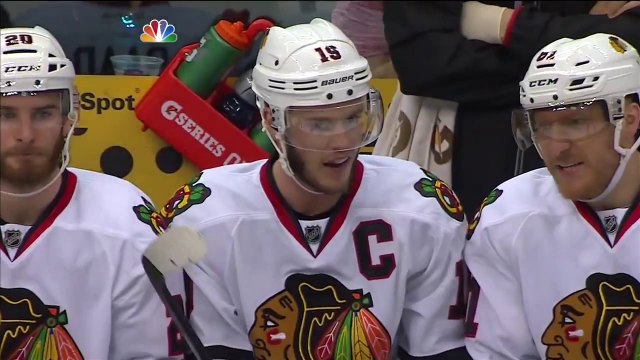Toews kicks puck to his stick and scores