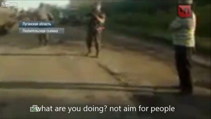 Nazi Guard shoots at unarmed people