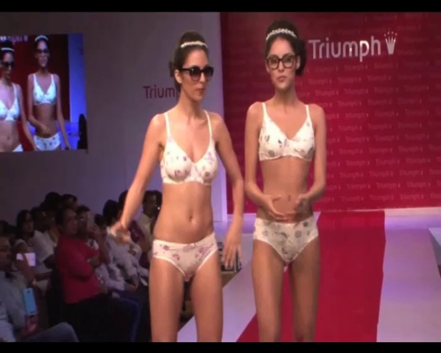Models walk the ramp in bikini