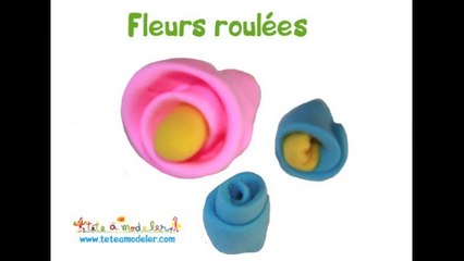 Fleurs roulées en pâte à modeler ou pâte à sel