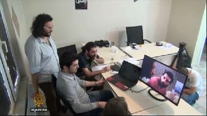 Anti-Assad activists campaign against voting