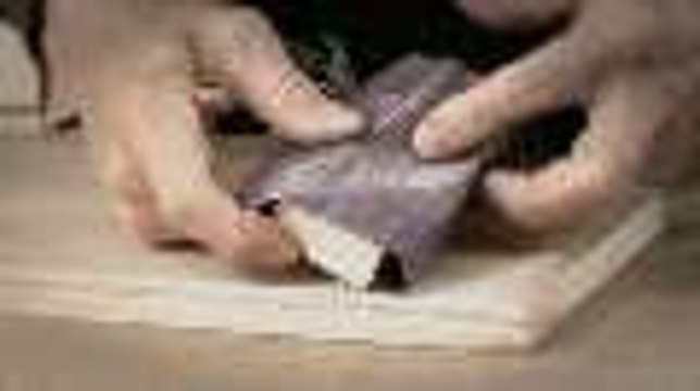 Make a comfortable sanding block with a belt-sander belt