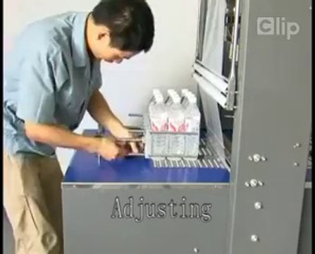 máy co màng lốc nước yến bán tự động, máy bọc màng co lốc 12 chai