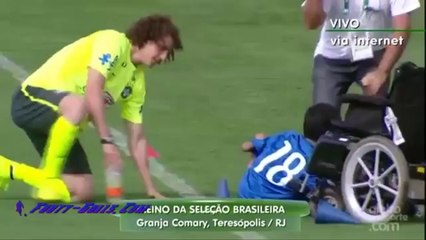 David Luiz talks and watch a child with disabilities making skills