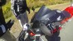 Biker almost killed and decapitated by flying license plate!