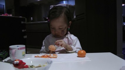 Girl Eating Oranges
